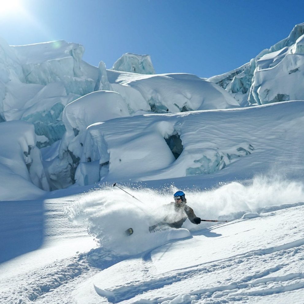 Powder turns and face shots with the best majestic glacier backdrop.