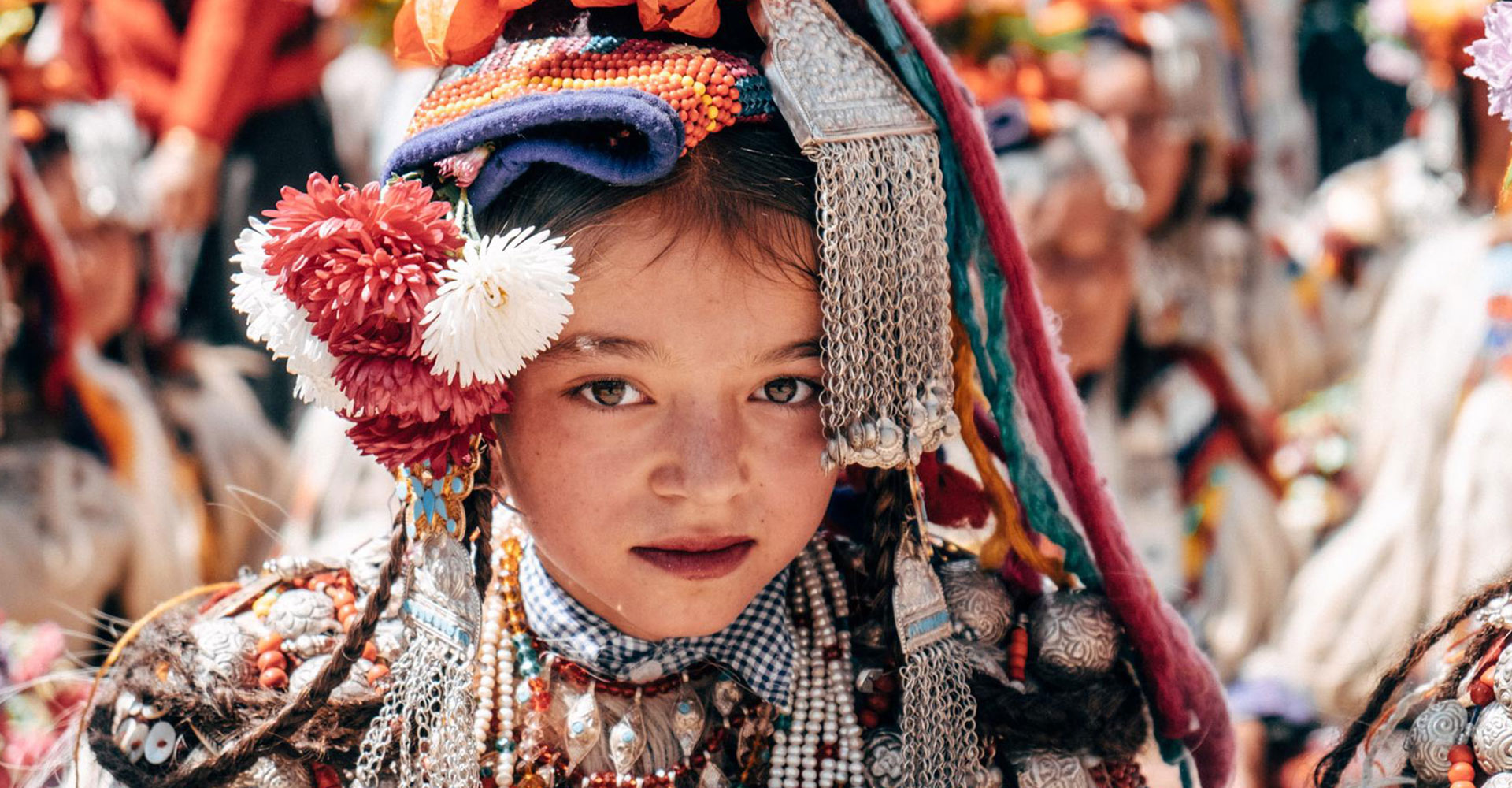 An Aryan girl in her hand made traditional dress and headpiece.