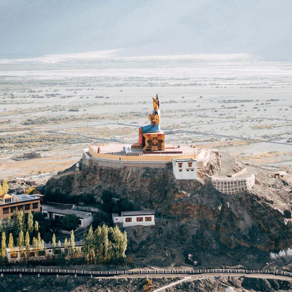 The impressive 32 meter tall Buddha statue of the Diskit monastery facing the Pakistani border spreads peace throughout the Valley.