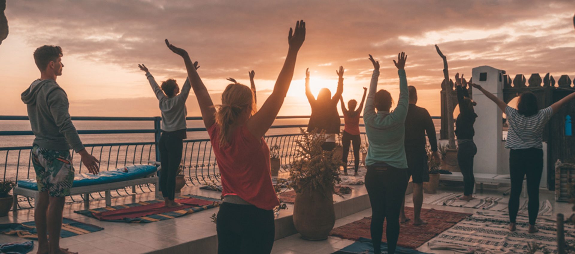 A sunset yoga session on our rooftop terrace is the best recovery from all the surfing.