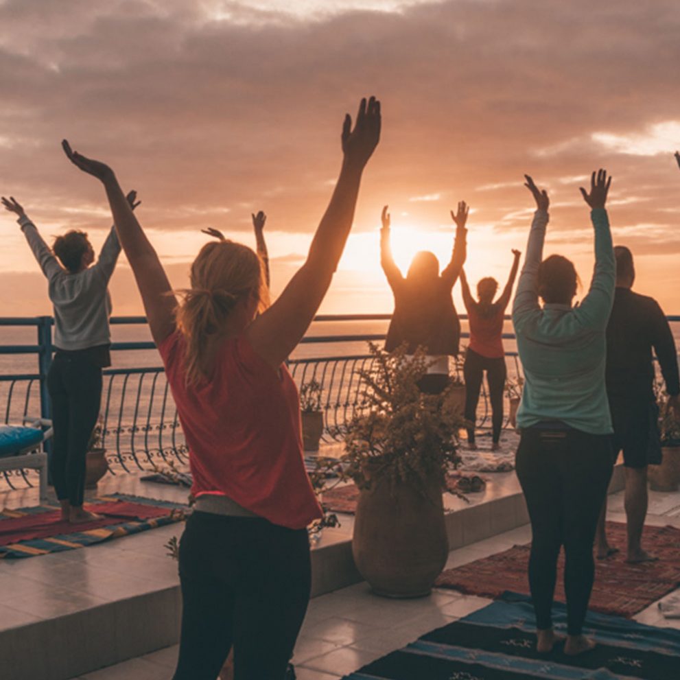 A sunset yoga session on our rooftop terrace is the best recovery from all the surfing.