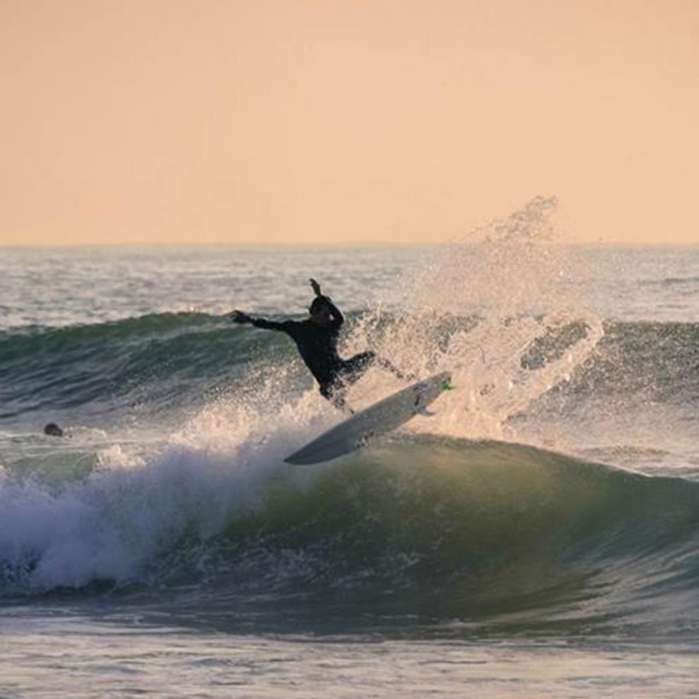 A big splash on the lip of this beautiful wave is the perfect way to end a sunset surf session.